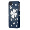White shamrocks on blue background