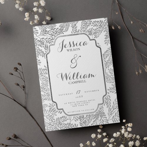 White silver glitter foliage border script wedding invitation