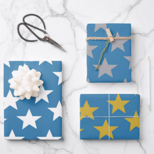 White silver gold stars wrapping paper sheets