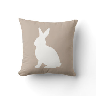 White Sitting Bunny Silhouette On Beige Easter Throw Pillow