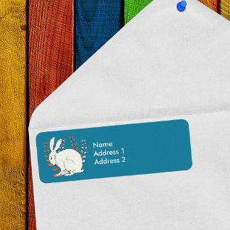 White sitting Rabbit Orange White Plants on blue Label