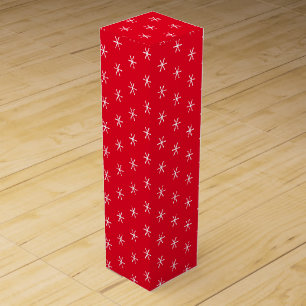 White snow stars, snowflakes red gift wine box