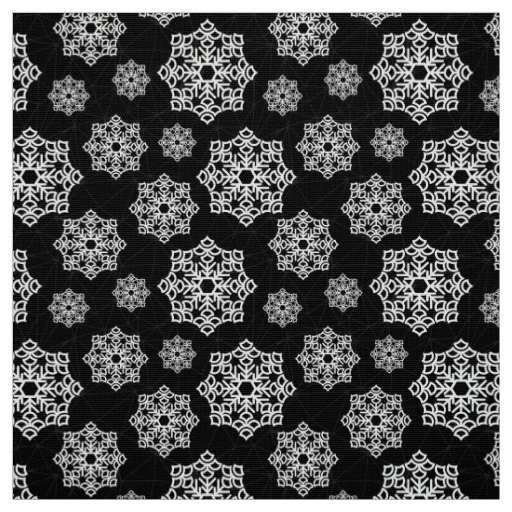 White snowflake on black with fish scales pattern fabric