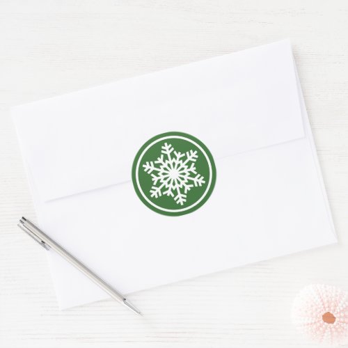 White Snowflake On Traditional Green Classic Round Sticker