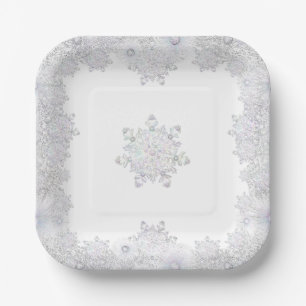 White snowflake paper plates