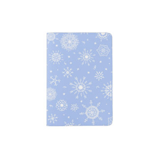 White snowflakes on blue passport holder