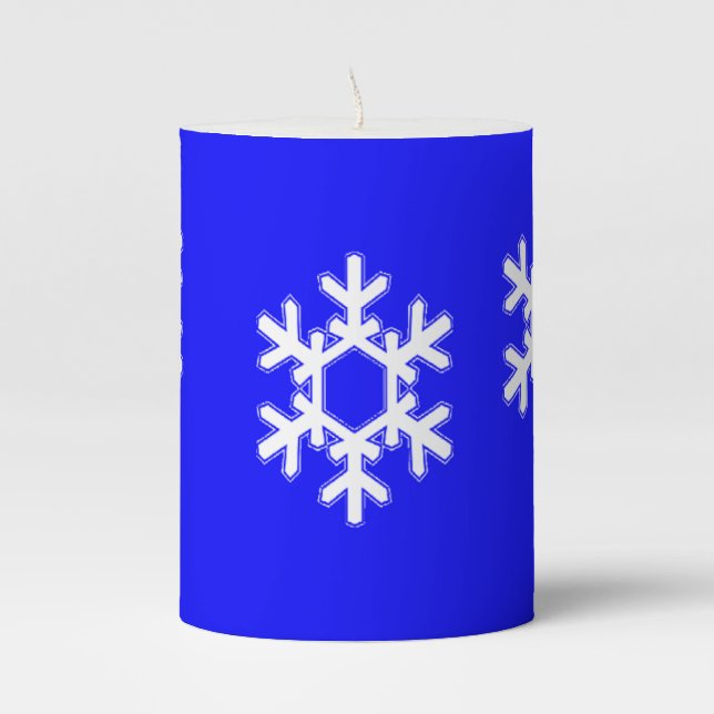 White snowflakes on blue pillar candle (Front)