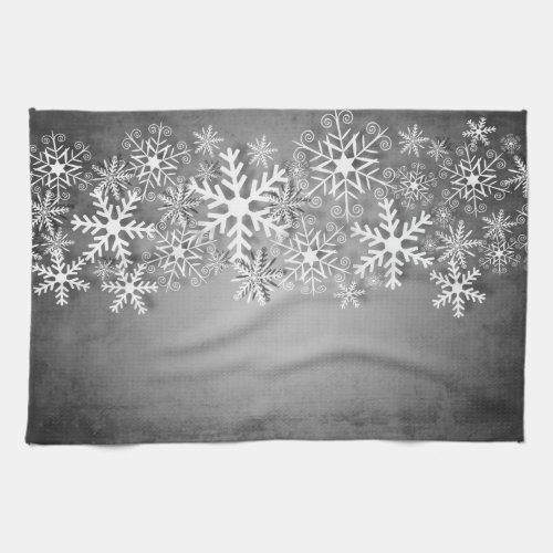 White snowflakes on gray kitchen towel