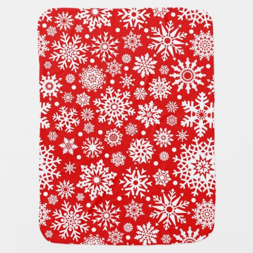 White snowflakes on red baby blanket