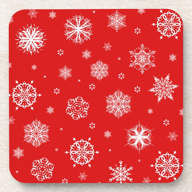 White snowflakes on red background drink coaster (Front)