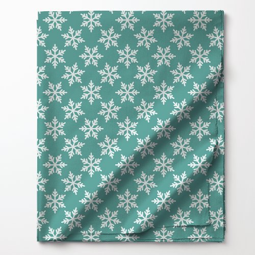 White Snowflakes On Teal Fabric