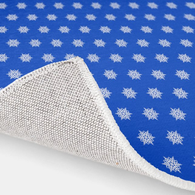 White snowflakes pattern on blue rug (Indoor)