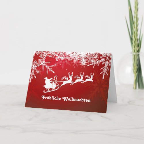 White snowflakes Santa reindeers on red German Holiday Card