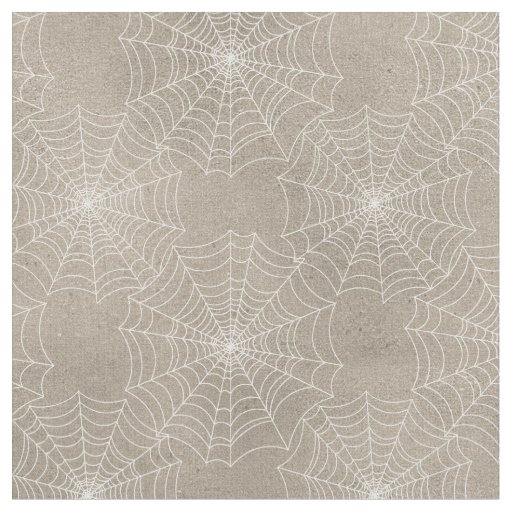 White Spider Webs on Tan Fabric