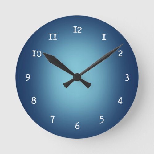 White spotlight on blue round clock