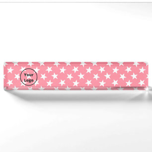 White stars on pink desk name plate