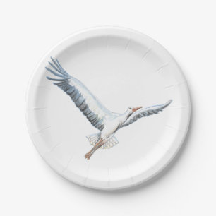 White stork flying paper plates