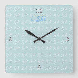 White Stylized Skiers Skiing and i. Ski. text Square Wall Clock