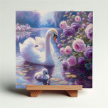 White Swan and Cygnet with Purple Roses Ceramic Tile<br><div class="desc">Transform your living space into an artful sanctuary with our White Swan and Cygnet with Purple Roses Ceramic Tile. An impressionist's brush unveils a serene pond, where a majestic swan guides its cygnet amidst the enchanting embrace of purple roses. Crafted with precision on high-quality ceramic, this tile is a masterpiece...</div>