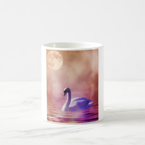 White Swan floating on a misty lake Coffee Mug