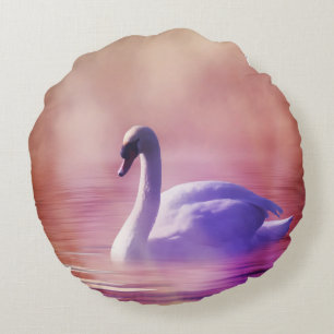 White Swan floating on a misty lake Round Pillow