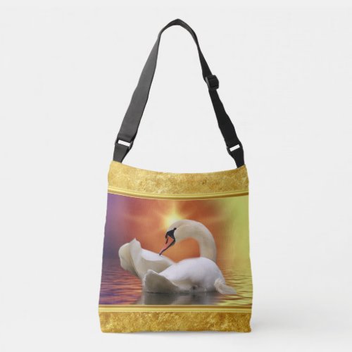 White Swan in a lake with a orange gold sunset Crossbody Bag