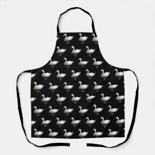 White swan on black apron