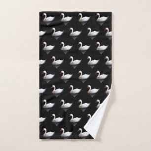 White swan on black hand towel 