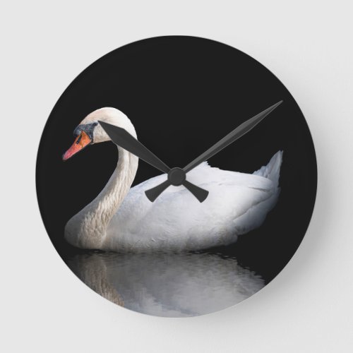 White swan on black round clock