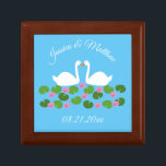 White Swans and Water lilies Wedding Custom Gift Box<br><div class="desc">This awesome Wedding gift box features a digital art image of a pair of beautiful white swans with orange becks facing each other looking like they are kissing. Underneath the swans is a group of pretty pink water lily flowers with yellow centers and green lily pads. A beautiful wedding design....</div>