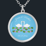 White Swans and Water lilies Wedding Custom Silver Plated Necklace<br><div class="desc">This beautiful Wedding necklace features a digital art image of a pair of beautiful white swans with orange becks facing each other looking like they are kissing. Underneath the swans is a group of pretty pink water lily flowers with yellow centers and green lily pads. A beautiful wedding design. There...</div>
