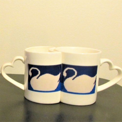 White Swans Silhouette in Blue Lake Crochet Coffee Mug Set