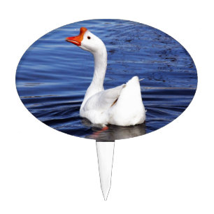 white swimming goose in blue water cake topper