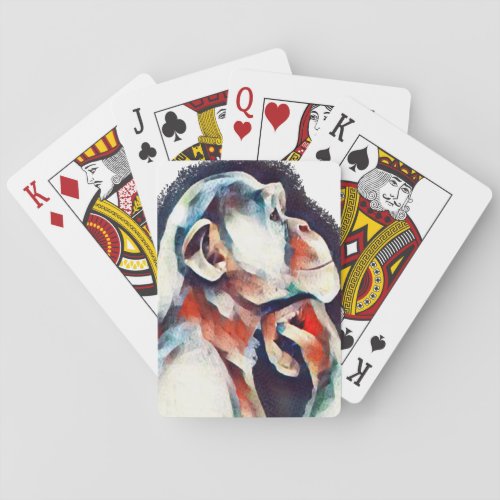 White thinker monkey playing cards