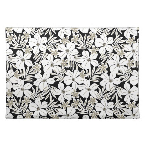 White tropical flowers on black placemat