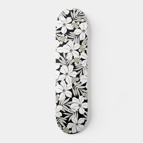 White tropical flowers on black skateboard