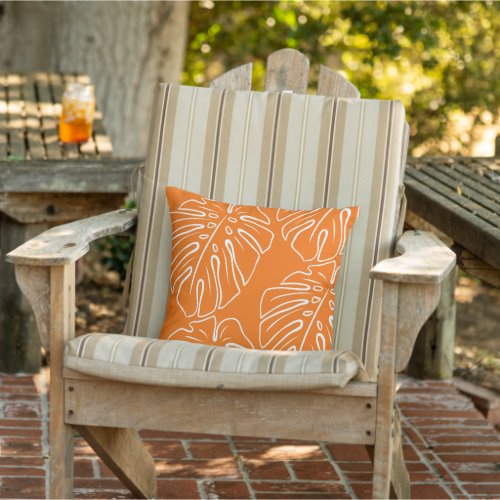 White Tropical Leaf Motif On Bright Orange Outdoor Pillow