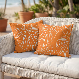 White Tropical Leaf Motif On Bright Orange Outdoor Pillow