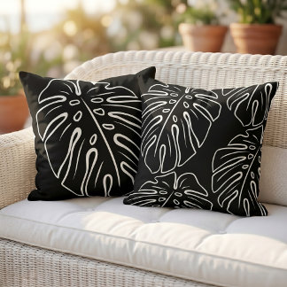 White Tropical Leaf Motif On Stylish Black Outdoor Pillow