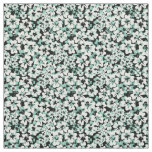 White, turquoise flowers on a black. fabric