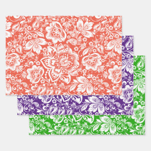 White vintage damask on orange, purple and green wrapping paper sheets