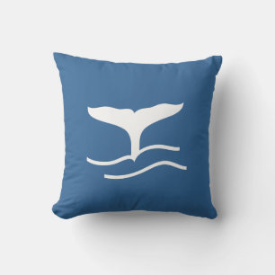 white whale tail on blue pillow
