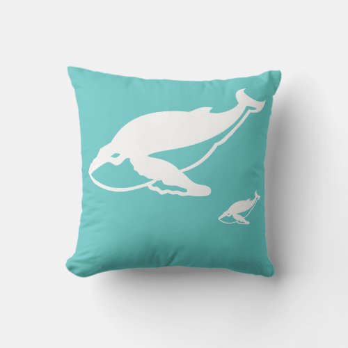 white whales  on teal blue pillow