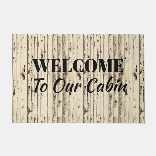 whitewashed wood welcome to our cabin doormat