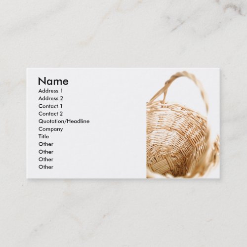 Wicker basket on white background business card