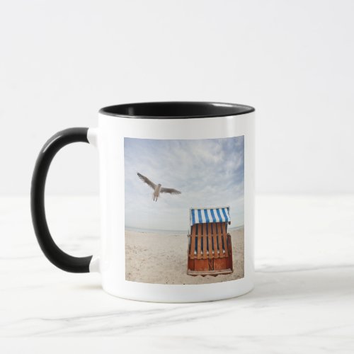 Wicker beach chair on beach mug