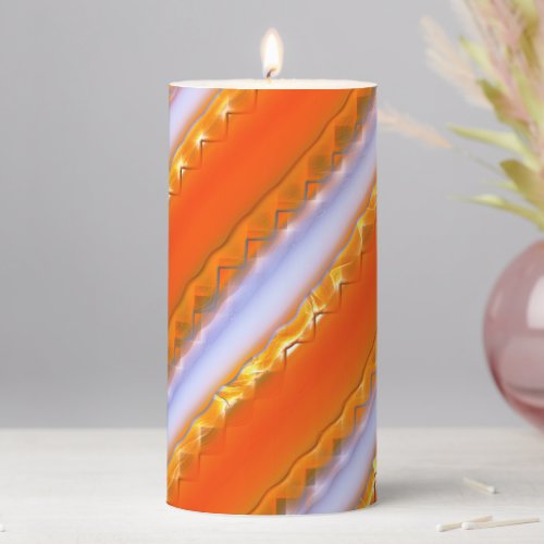 Wide stripes in ice to yellowish orange lace style pillar candle