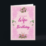 Wife Birthday with Pink Roses Card<br><div class="desc">A pretty birthday card for a wife. An elegant tracery in pink sets of the four pink roses. The background is a pale pink pattern of flowers. A lovely card to send to a wife on her birthday.</div>