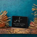 Wifi Password Sign Black Plaque<br><div class="desc">Modern WiFi password sign to share your network information with guests. Perfect for Airbnb rentals,  bed and breakfast rooms and more. Minimal modern design in black and white with elegant script and simple,  easy to read typography.</div>