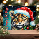 Wild Christmas Wishes Santa Hat Cheetah Cat Holiday Card<br><div class="desc">Send fierce and festive greetings with our Wild Christmas Wishes Santa Hat Cheetah Holiday Card! This unique card features a striking illustration of a cheetah wearing a Santa hat, surrounded by holiday decorations. Perfect for sharing bold and joyful wishes with friends and family, this card captures the adventurous and playful...</div>